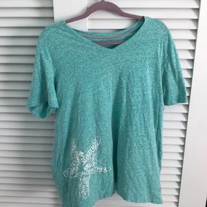 nice blue shirt with a starfish